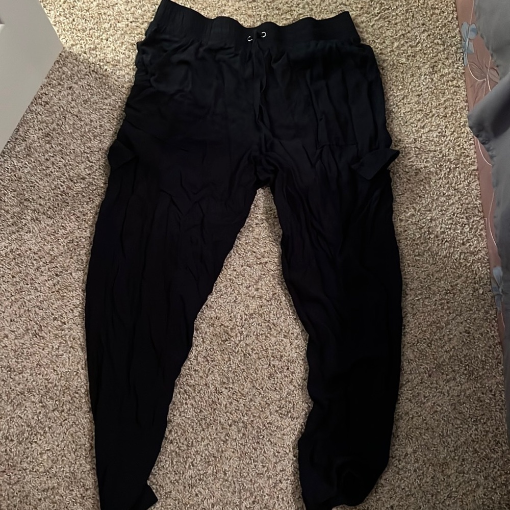 Black jogger style pants.. cargo pockets on either side. Drawstring